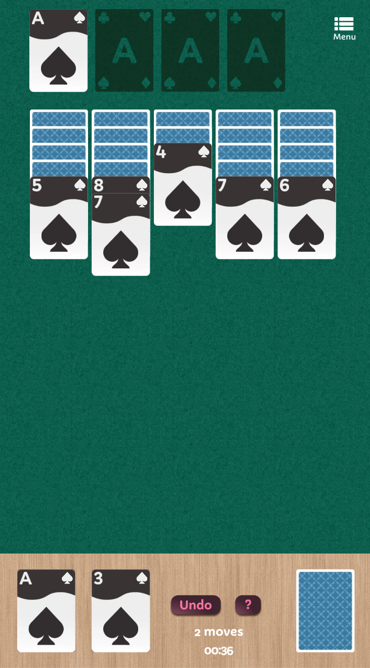 A game of Zigzag Solitaire on a green felt table